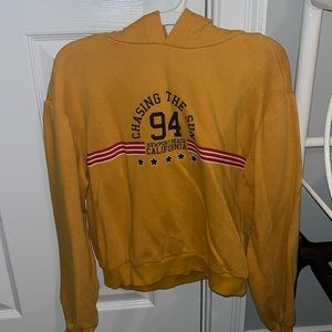 Divided by H&M Dark yellow cropped sweatshirt, size small in juniors